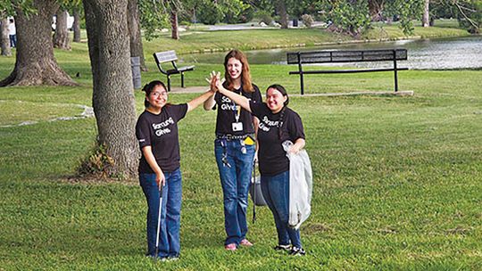 Samsung interns clean park before July 4 celebration