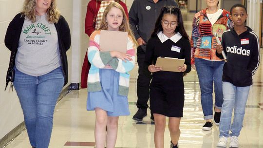 Student leaders host the Taylor ISD Ambassadors for a guided tour of their school. Students from left are Raegan Westerman, Amy Robles and Khalib Lewis. Adults from left are Principal Kerrie Pierce and Ambassadors Rachael Westerman, Tim Mikeska and Billie Logiudice.