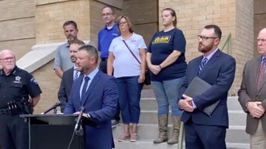 Williamson County Sheriff Mike Gleason and Deputies Association President Charles Duvall held a press conference outside the Williamson County Historic Courthouse. The association suggested it would possibly seek state assistance to address needs. Screenshot from Deputies Association strea...