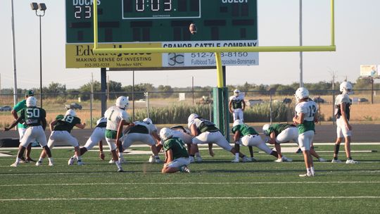 Taylor High School varsity football goes through a special teams drill with kicking extra points on Wednesday, Aug. 9 at the end of practice held at The Duck Pond. Photos by Andrew Salmi