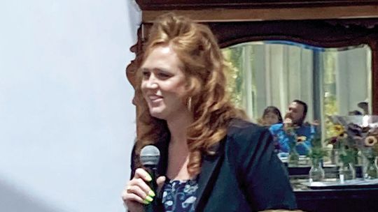 Lindsie Almquist, president of Craftsman College, a trades school launching this fall, speaks July 17 at the Greater Taylor Chamber of Commerce monthly luncheon at the Taylor Mansion. Photo by Nicole Lessin