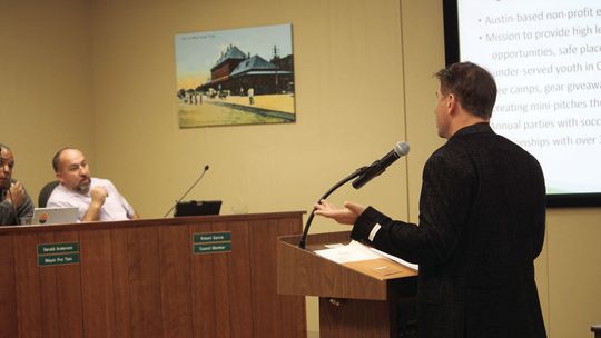 Aaron Rochlen, the founder and board chair of Soccer Assist, presents his organization’s plan to help install a mini pitch for individual and pickup soccer games at Murphy Park. Photo by Nicole Lessin