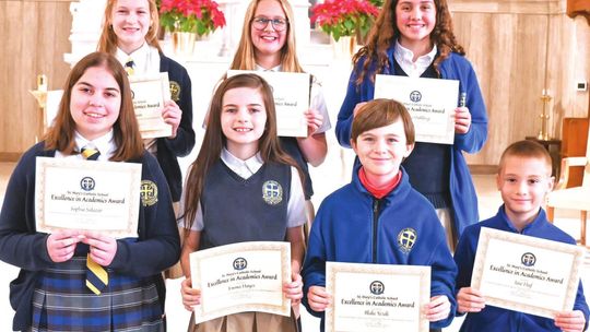 St. Mary’s Catholic School students in Taylor celebrate being named winners of the Award of Excellence for the second quarter of the 2021-22 school year. Courtesy photos