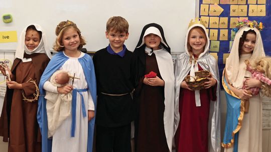 St. Mary’s second grade students show off their saint costumes. Courtesy photos