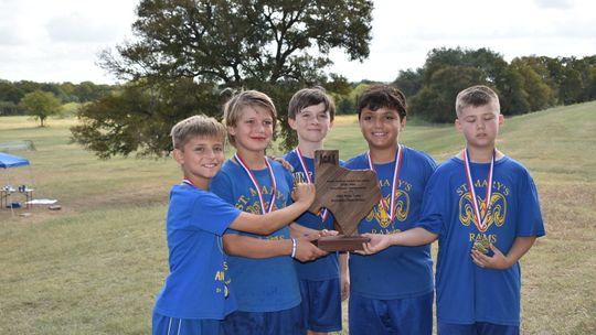 Rams Elementary boys team poses with the 1st place trophy at the Austin Athletic Association Cross Country meet. Courtesy Photo