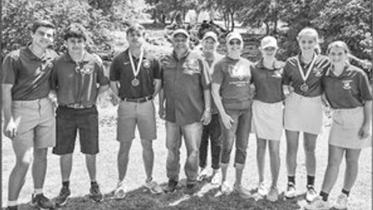 The Rams taking a team picture after a round of golf. Freshmen Kolbe Barta (left) and David Pena, junior Brady Altman, Coach Rick Cobia, Principal Heidi Altman, Coach Traci Zimmerhanzel, freshmen Sydney Zimmerhanzel, Mercy Barta and Leah Altman. Courtesy Photo