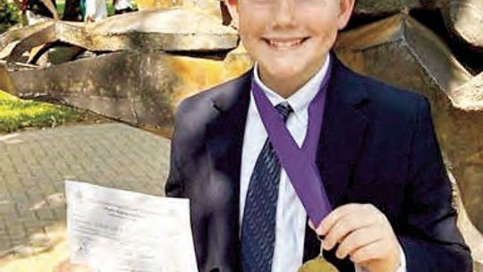 Gunner Streit, a fifth grader at St. Mary’s Catholic School in Taylor, placed first in poetry interpretation with the poem, ‘Paul Revere’s Ride’ by Henry Wadsworth Longfellow at a state meet May 6. Courtesy photos