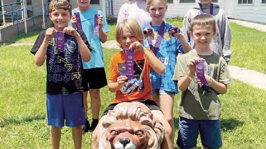 St. Paul Lutheran School students posing with their awards after participating in the Private Schools Interscholastic Association academic competition May 6 in Fort Worth. Courtesy photos