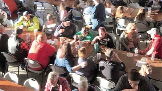 The crowd in the Coupland Fire Station at a previous Coupland Volunteer Fire Department chili supper. Photo courtesy Coupland Volunteer Fire Department