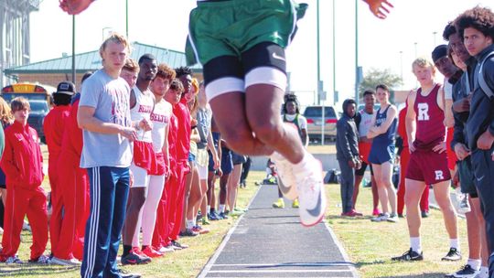 Jarvis Anderson jumps sky high at the 2022 Cotton Boll Relays this past Thursday, March 10. Anderson finished first in the 110- and 300-meter hurdles, 4x400 meter relay and the long jump. He also finished second in the triple jump. Photos by Matt Hooks