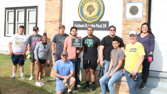 A group of volunteers from Taylor High School observed Columbine Day on April 20th with a day of service at American Legion Post 39. Taylor. American Legion representative Scott Dean is joined by THS Counselor Laurie Morris, Assistant Principal Olivia Rodriguez, and seniors Donovan Palacio...