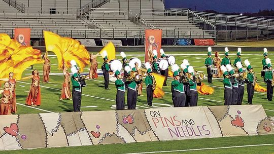 The Taylor band and color guard performs their show at the Lost Pines Marching Festival in Bastrop. Courtesy Photo