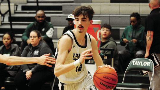 Taylor boys notch pair of tourney victories