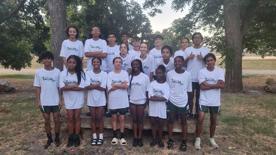 The Taylor High School cross country program gathers together for a picture on Friday, Aug. 18 during the Rockdale Invitational meet. Photo courtesy of Karmen Sanders