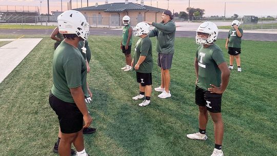 Taylor football opens fall camp with energy, focus