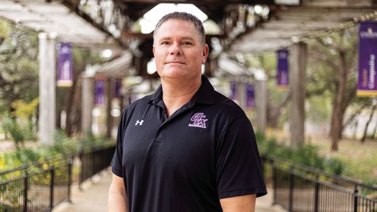 Coach Mokry poses for a picture after being named head coach at Concordia Texas University. Photo from Concordia Texas University