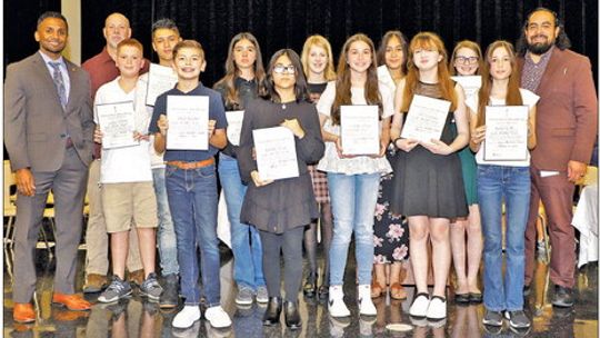 Taylor Middle School’s 2023 NJHS inductees are Payton Burrow, Samuel Cottrell, Nathalie Cruz, Jill Laurence, Tera Mullins, Katalina Neas, Morgan Patschke, Albert Ragland, Samantha Schroeder, Melissa Solis Carbajal and Davian Tellez. Congratulating them are Superintendent Devin Padavil, Pri...