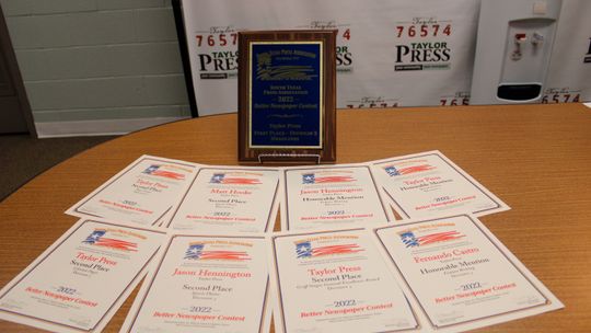 The Taylor Press studio is scattered with recognitions from the South Texas Press Association’s 2022 Better Newspaper Contest. Photo by Matt Hooks