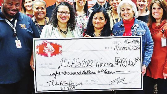 Six teachers in Hutto ISD received a total of $48,000 from the Grow Your Own grant scholarship. At the presentation are (front row, from left) Tony Carr, Natacha Barbosa, Uma Rao and Superintendent Celina Estrada Thomas; (Middle row, from left) Elisa Hood-Waddle, Lindsay Brown, Gloriana Pr...