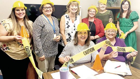 Team lays cornerstone for chamber banquet