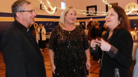 The Rev. Father Keith Koehl, Heidi Altman and Cecilia Abbott enjoy the Cultura Vitae event. Courtesy photo