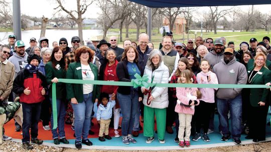 Above: Community members join together with members of Good Life for a ribbon cutting at Percussion Park Saturday morning.Below: Mayor Brandt Rydell (left) and City Manager Brian LaBorde join in on the fun of a performance by the Soulshine Rhythm Experience. Photos by Jason Hennington