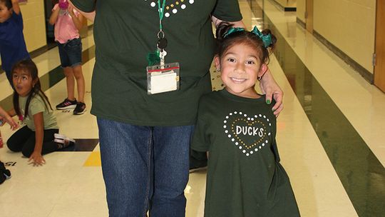 Bella Arredondo, and her mom, Kim, dress alike for International Dot Day. Photos by Tim Crow