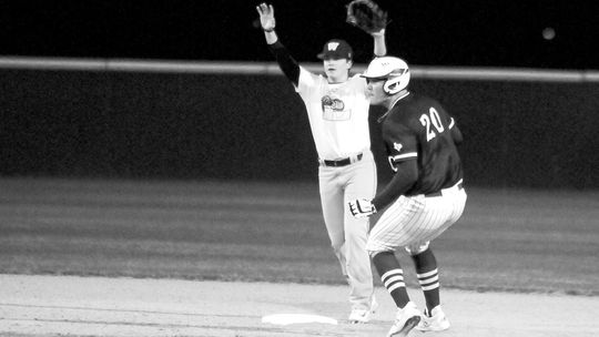 Tyler Bonkowski keeping his eyes on the catcher as he steals second base after a wild pitch. Photo by Larry Pelchat