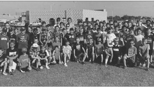 The Thrall Tigers from grades second through eighth gather for a group photo following the football portion of the summer all-sports camp. Photos courtesy of Thrall ISD