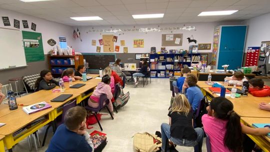 Thrall Middle School students spend time reading with Thrall Elementary School students Feb 15. Both campuses would be affected by a May bond election if a proposition passes. Facebook / Thrall Elementary School