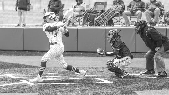 Bobby Clark swinging and fouling off a ball to stay alive in the batter’s box. Photo by Larry Pelchat