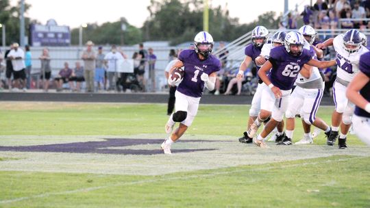 Thrall High School varsity football junior wide receiver Landon Gregory (1) runs with the ball on Sept. 8 during the Tigers’ dominant 49-0 victory at home vs. Florence High School. Photo by Larry Pelchat