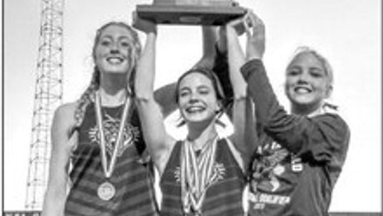 Brynn Leschber, Avery Koonce and Kassandra Jackson hold up the regional championship trophy after winning regionals. Courtesy Photo