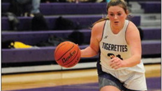 Tigerettes senior Miranda Richter dribbling the ball up the court Photo by Larry Pelchat