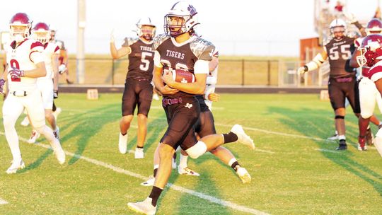 Tigers fall to Trojans, 44-20