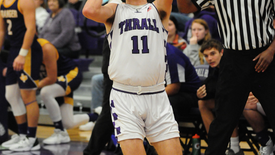 Tigers senior Carson Ball shooting a wide-open jump shot. Photo by Larry Pelchat