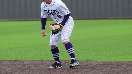 Anthony Sandoval getting low to the ground ready to field a ground ball. Photo by Evan Hale