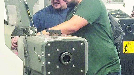 Zachary Gibson tries his hand at welding while learning more about technology classes offered to students.