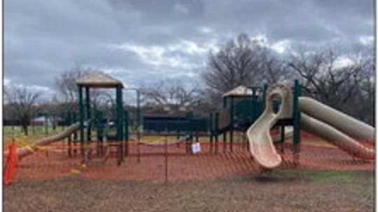 Fencing surrounds the playscape at Bull Branch Park prior to its removal last spring, after park officials deemed it unsafe. Photo courtesy of the city of Taylor