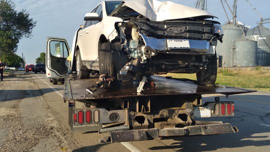 A crashed vehicle is towed in Granger after an accident July 3. Photo by Monica Stojanik