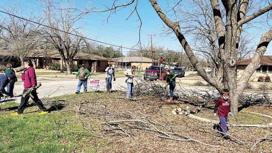 VOLUNTEERS CONTINUE CLEANUP EFFORTS