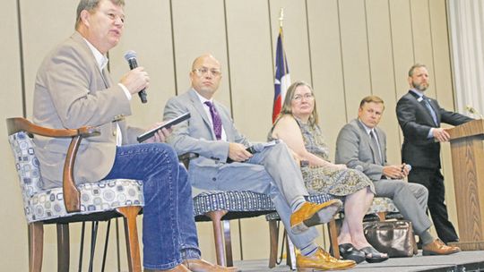 Panelists (from left) Gary Westbrook, Tom Oney, Liz Jones and Will McAdams discuss water and electricity resources in the region and state at the Pre-Legislative Summit Sept. 7. Photo by Nicole Lessin