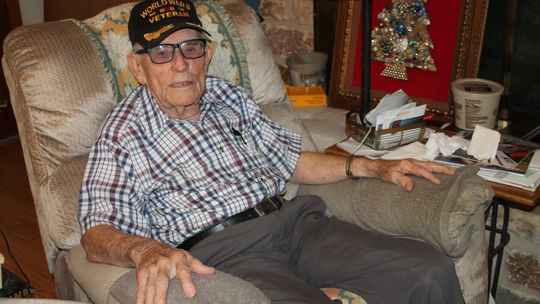 Veteran Archie Moczygemba sits at his Taylor home Sunday, Nov. 6.