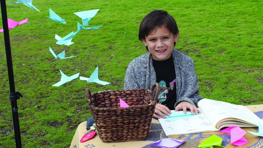 Wyatt Murray, 8, constructs origami shapes. Courtesy photos