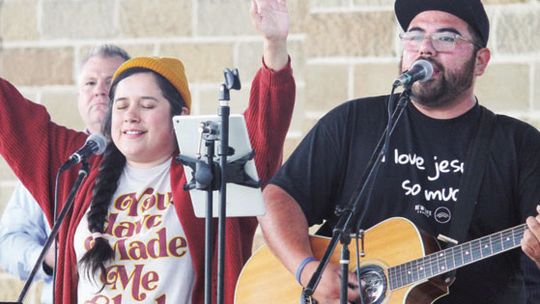 Ruth Diaz and Javier Diaz sing at Heritage Square in Taylor during last year’s National Day of Prayer Photo by Fernando Castro