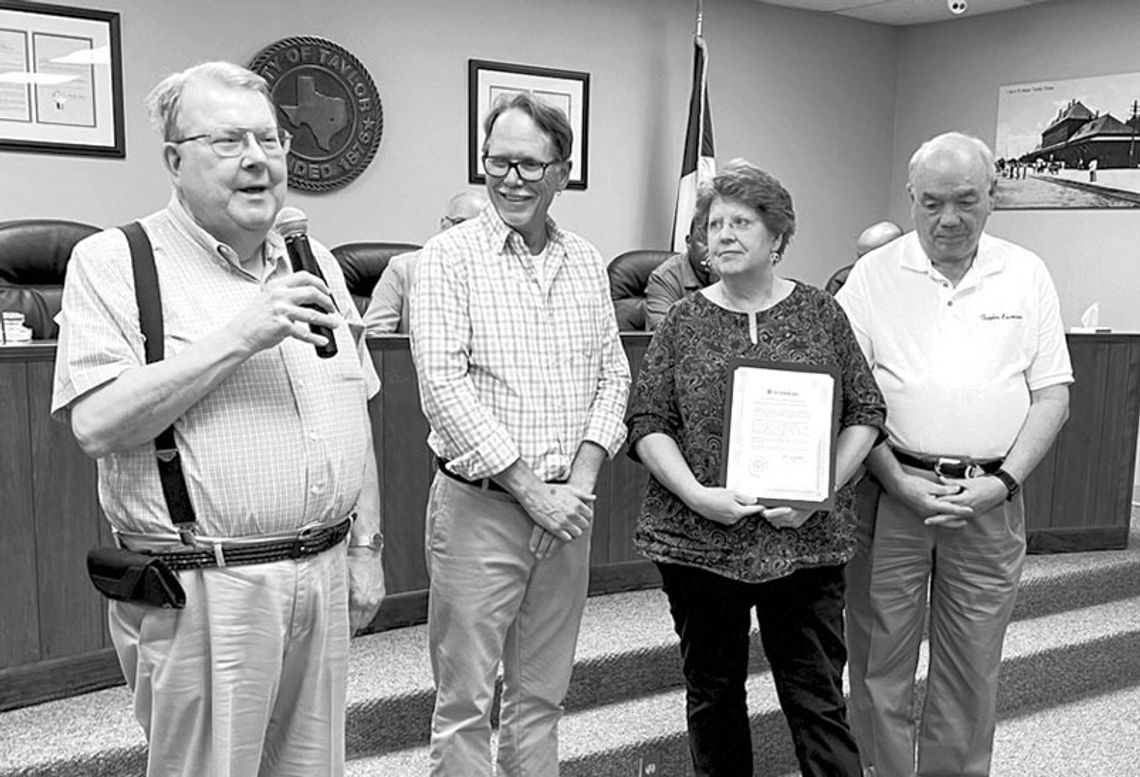 The Taylor Kiwanis Club was recently recognized for its 100 years of service by the Taylor City Council. Kiwanis President Rev. Travis Summerlin accepts the proclamation from Councilman Mitch Drummond. Also in attendance were Kiwanis secretary Karen Ellis and former Kiwanis president and A...