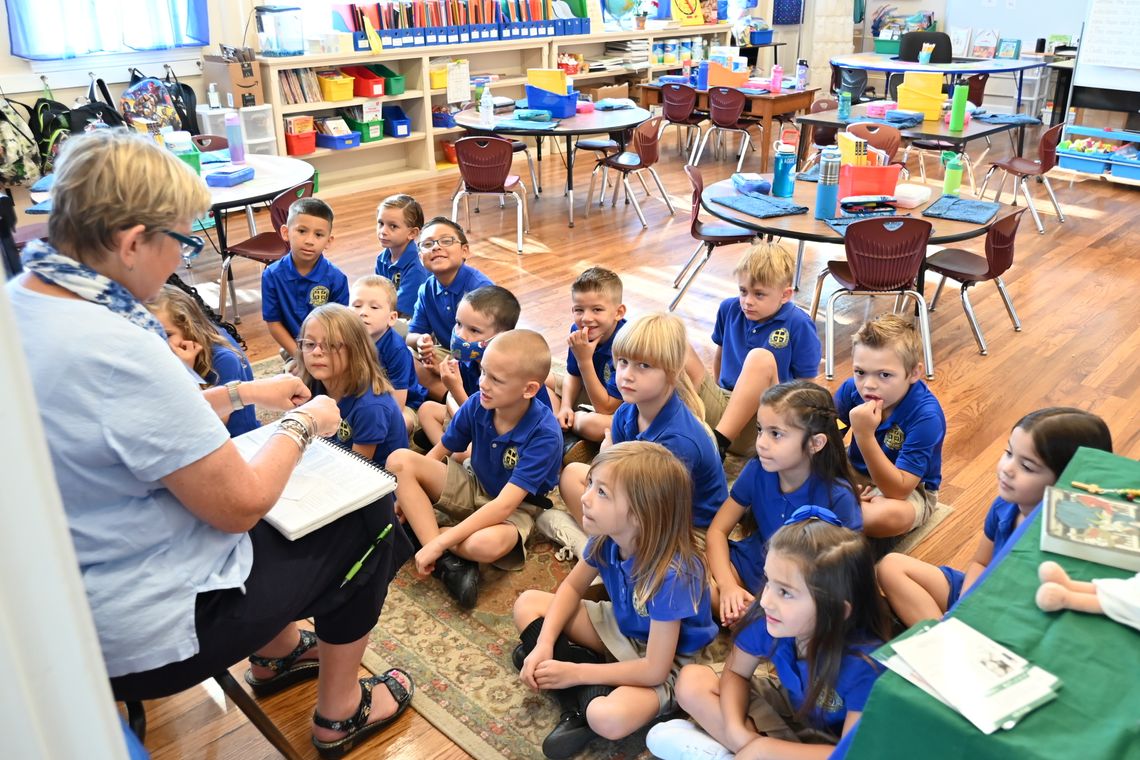 St. Mary’s Catholic School first grader listen intently as Betsy Hime teaches Heggerty Aug. 11.