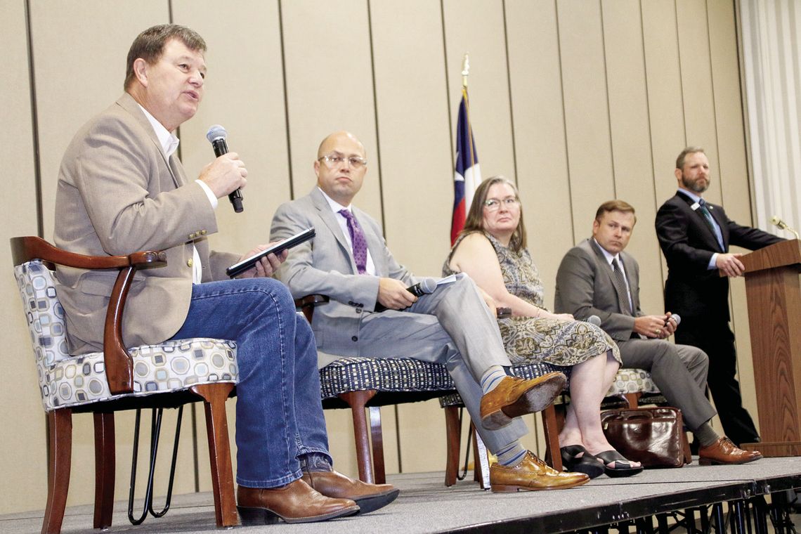 Panelists (from left) Gary Westbrook, Tom Oney, Liz Jones and Will McAdams discuss water and electricity resources for Williamson County. Photo by Jason Hennington