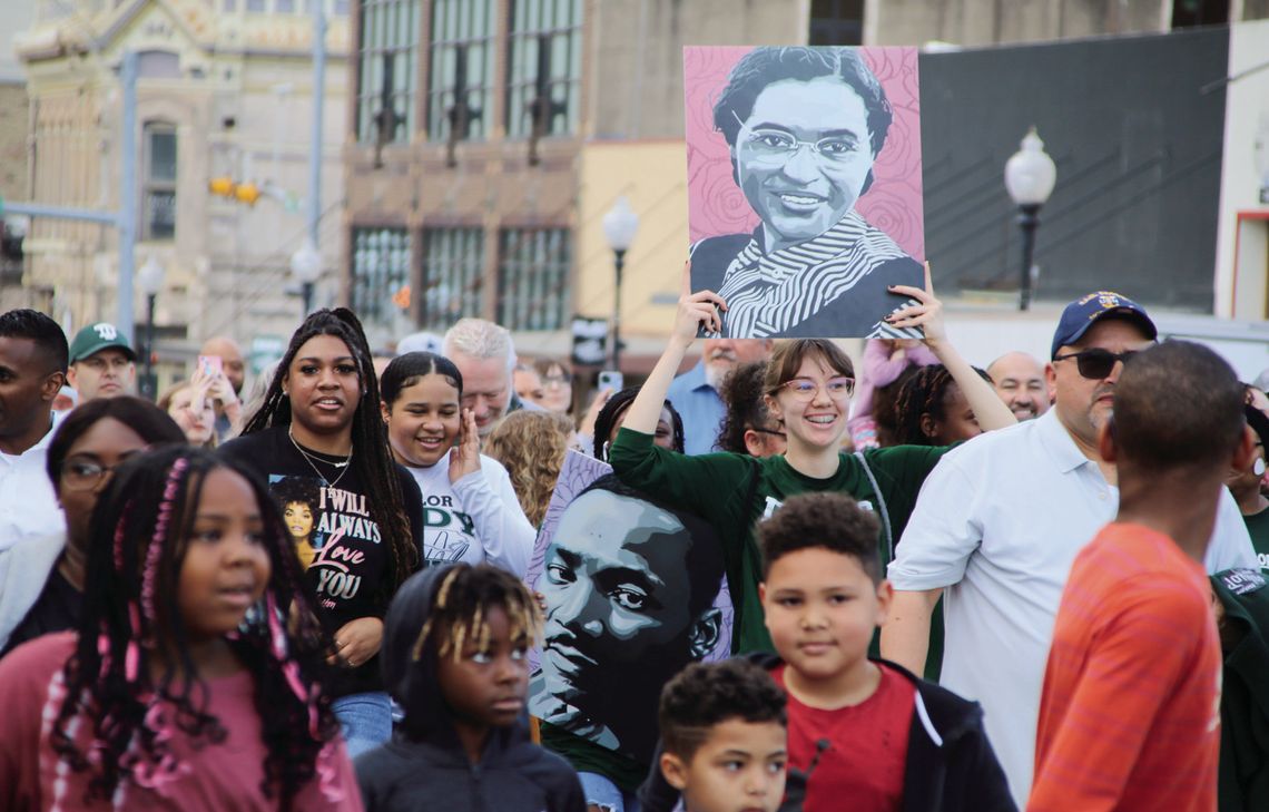 – In celebration of Dr. Martin Luther King Jr. Day, people marched from the Dickey Givens Community Center to Heritage Square.