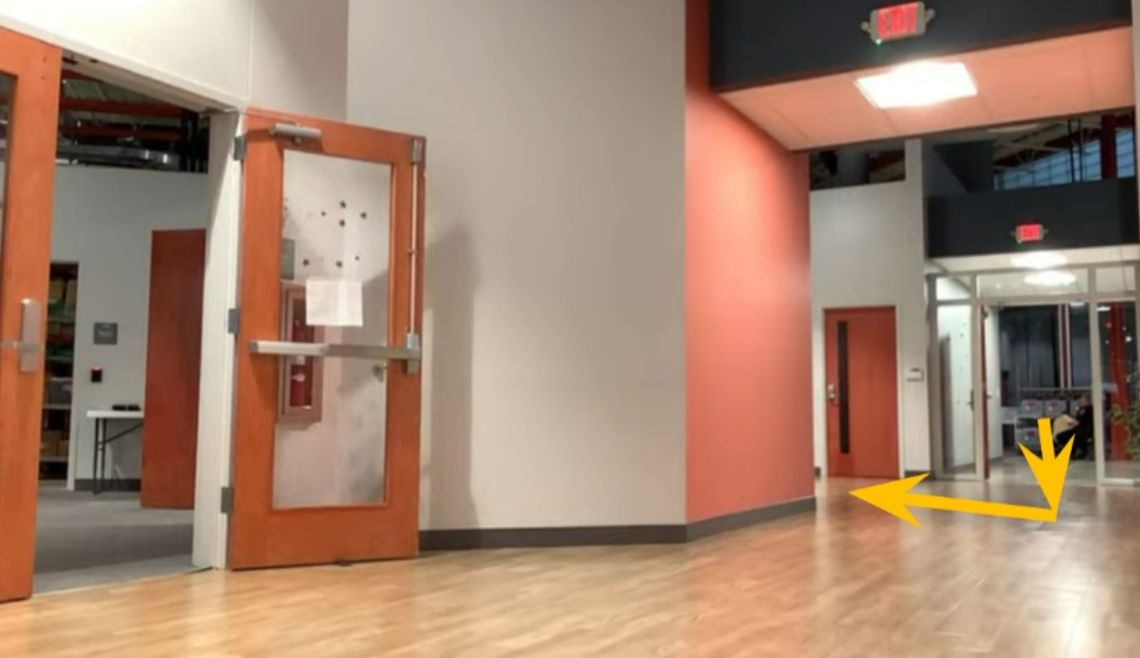 Yellow arrows show the hallway that witnesses said had no video surveillance while ballot boxes were being transported through it. Photo source: True Texas Elections, LLC